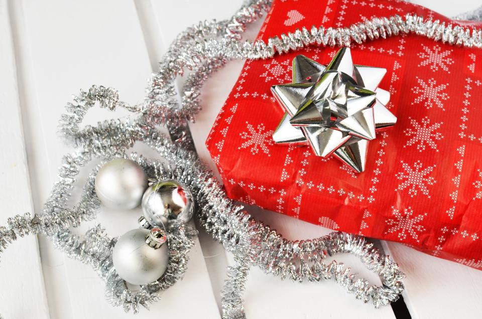 An assortment of wrapped gift boxes with ribbons ready for giving